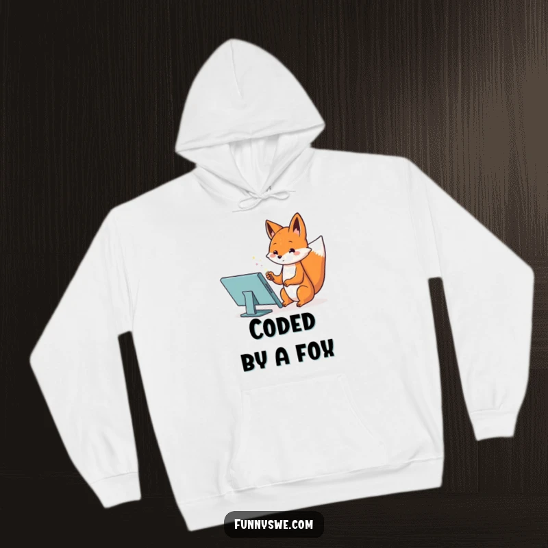 Funny hoodie showing a Kawaii fox using a magic wand on a tablet to design a website, comfortable and magical.