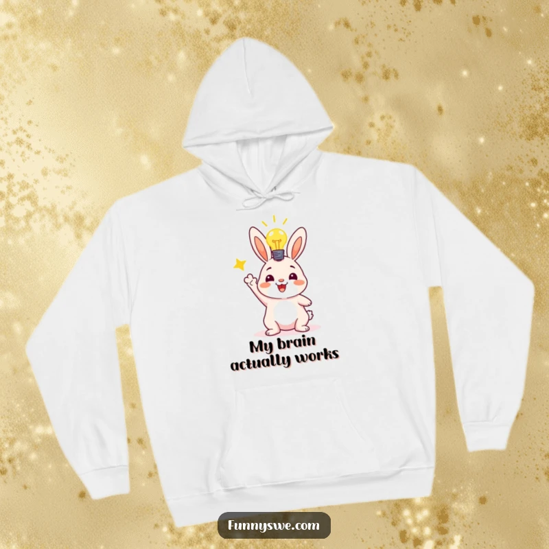 Funny hoodie showcasing a delighted bunny character with a shining lightbulb, ecstatic about a successful code deployment accomplishment.