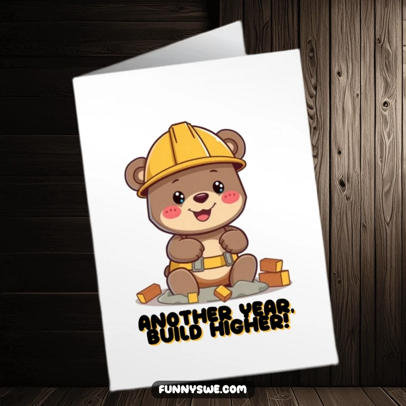 Funny Free Printable Birthday Card: Happy bear in hard hat builds virtual structure, ready to celebrate with humor.