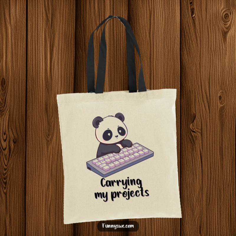 Funny tote bag with a panda typing rapidly on a giant keyboard. Ideal for carrying tech essentials humorously.